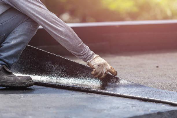 Professional Basement Waterproofing technician working in Bridgeton, IN